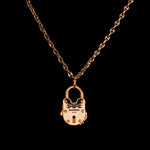 35mm Lock pendant in 18K rose gold, hanging