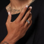 Classic Tri-Link with Diamond Bridges ring in sterling silver, worn on the hand