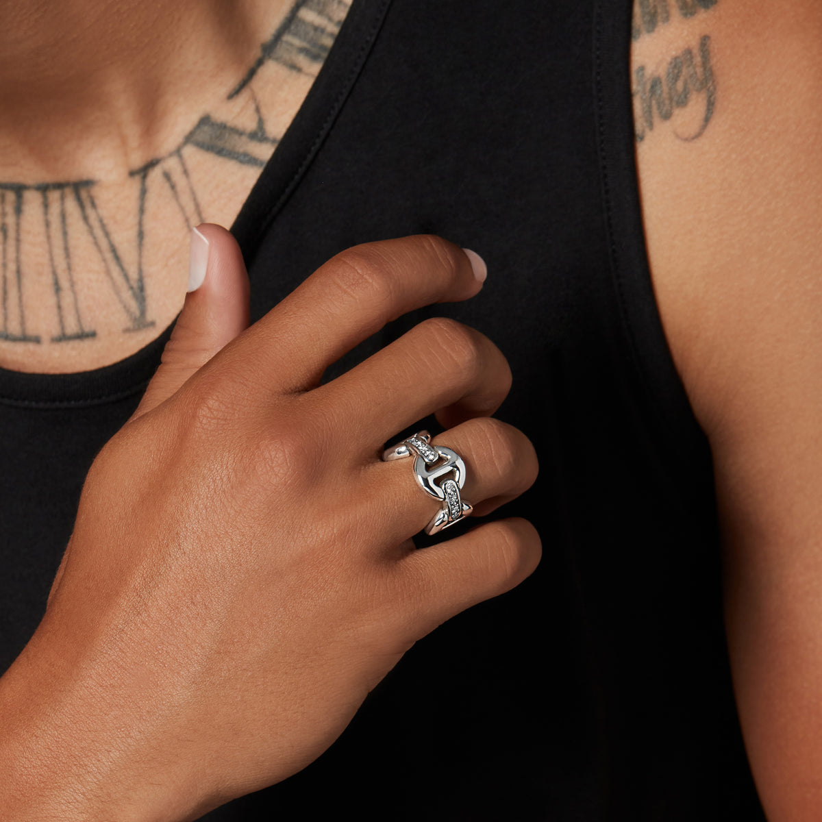 Quad Link with Diamond Bridges ring in sterling silver, worn on the hand