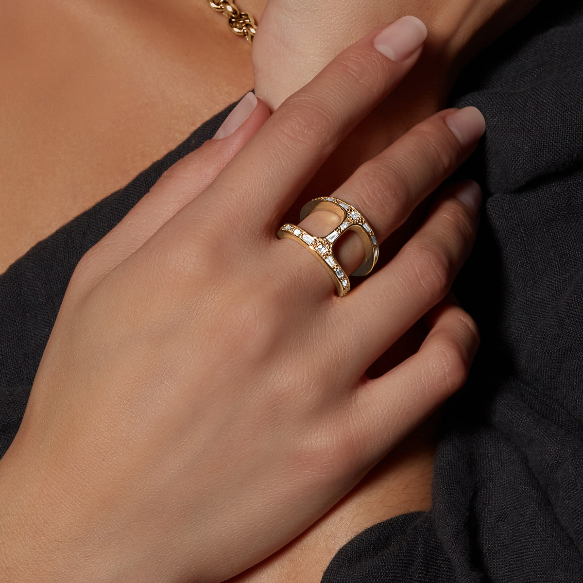 Phantom Baguette ring in 18K gold, shown with other pieces