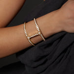 Phantom Cuff with Diamonds in 18K gold, shown with other pieces