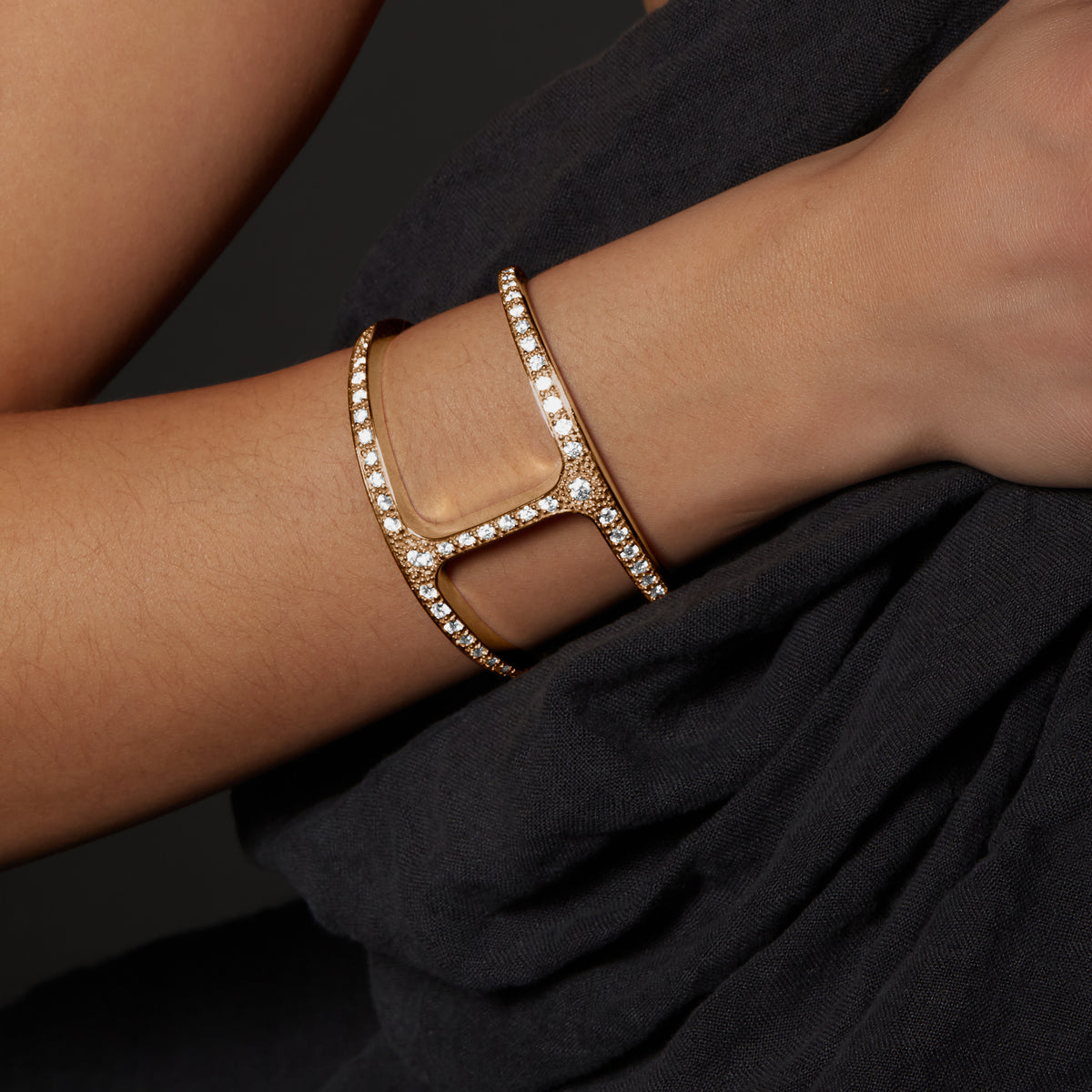 Phantom Cuff with Diamonds in 18K gold, shown with other pieces