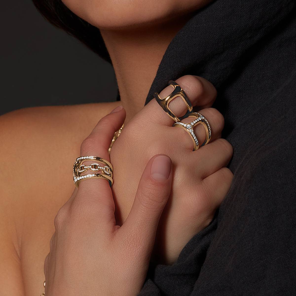 Dame Phantom with Diamonds ring in 18K gold, shown with other pieces