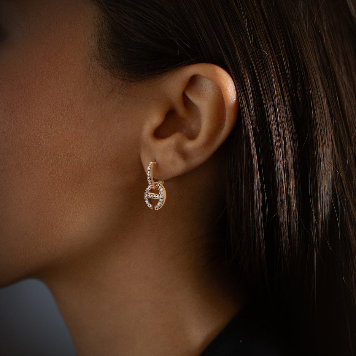 Klaasp with Diamonds earrings in 18K gold, worn on the ear