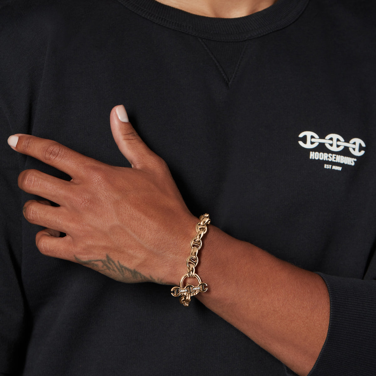 10MM Open-Link™ Bracelet in 18K yellow gold, worn on the wrist