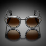Model III eyewear in Clear Grey, front view