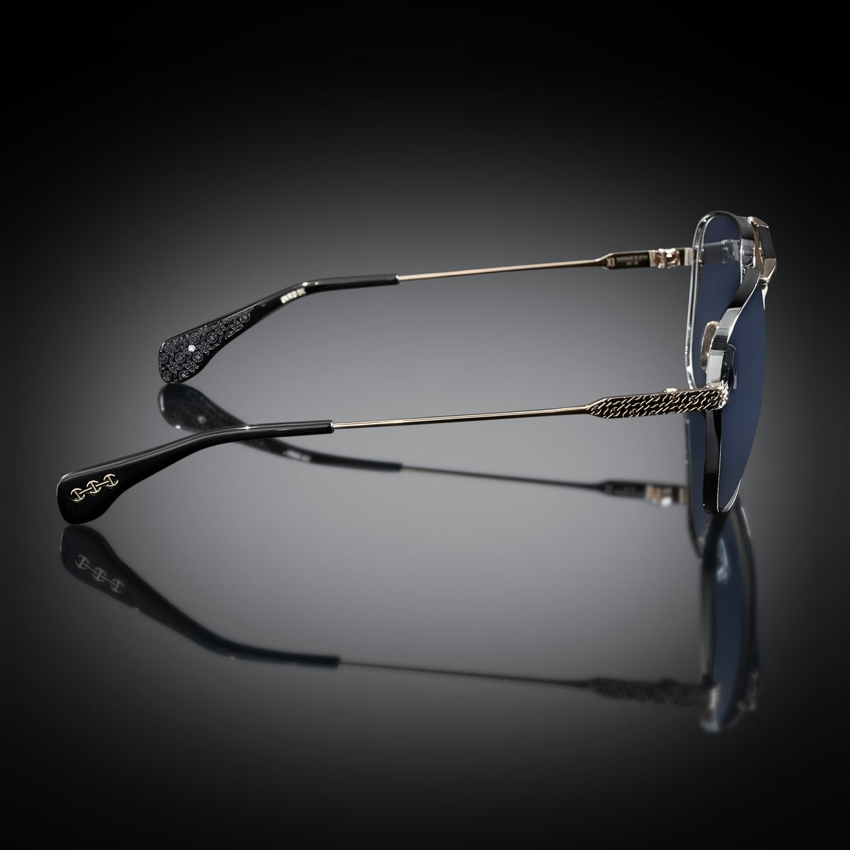 Model XI eyewear in Gun Metal-White Gold and Black, side view