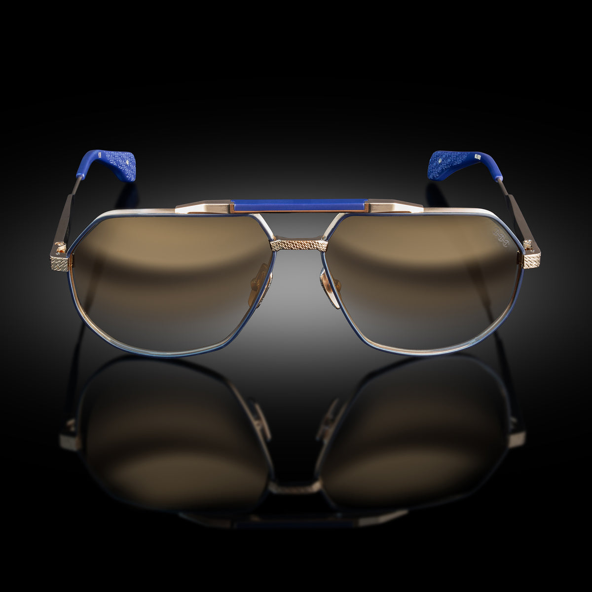 Model XII eyewear in White Gold and Matte Navy Blue, front view
