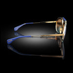 Model XII eyewear in White Gold and Matte Navy Blue, side view