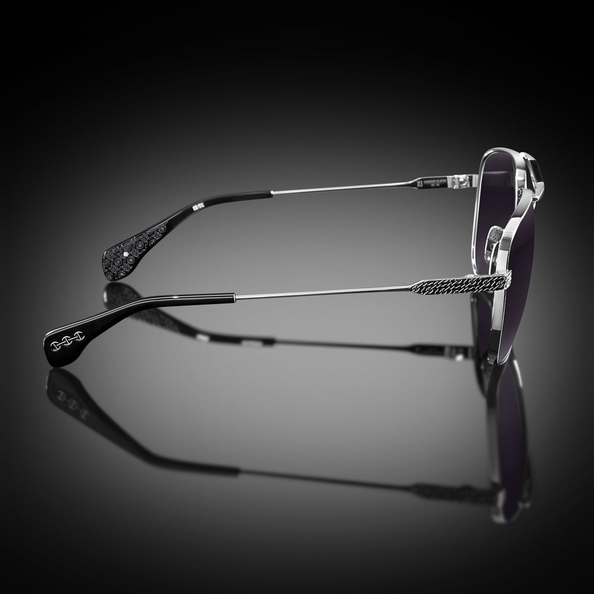 Model XI eyewear in Shiny Silver and Black, side view