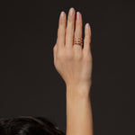 Micro III ring in 18K gold, shown with other pieces
