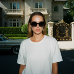 Model III eyewear in Black and Grey Tortoise Fade, worn