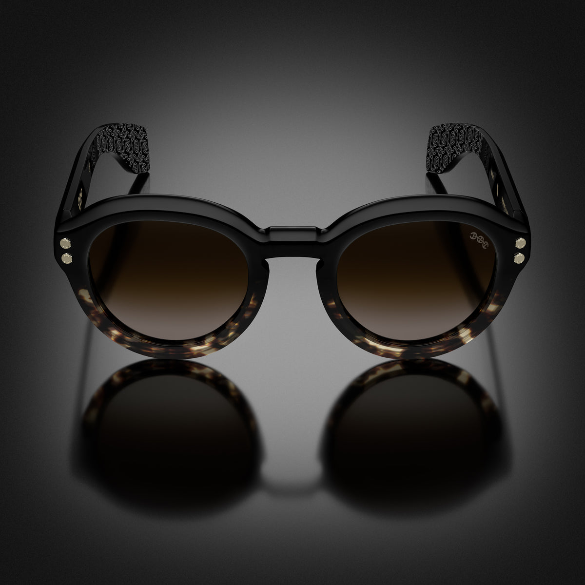 Model III eyewear in Black and Tortoise Fade, front view