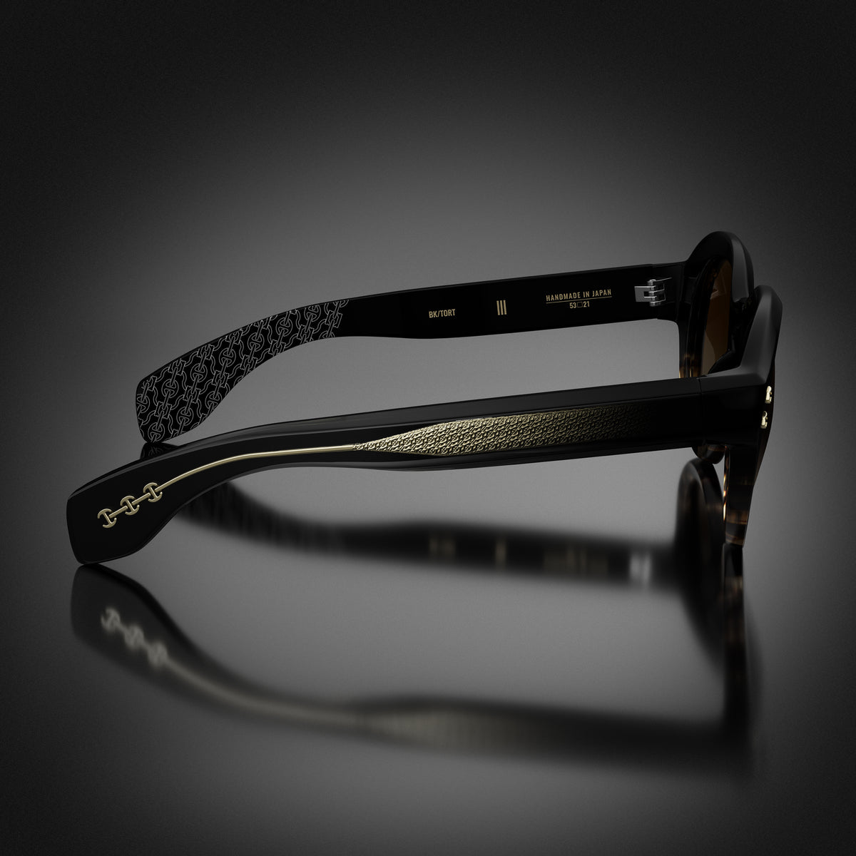 Model III eyewear in Black and Tortoise Fade, side view