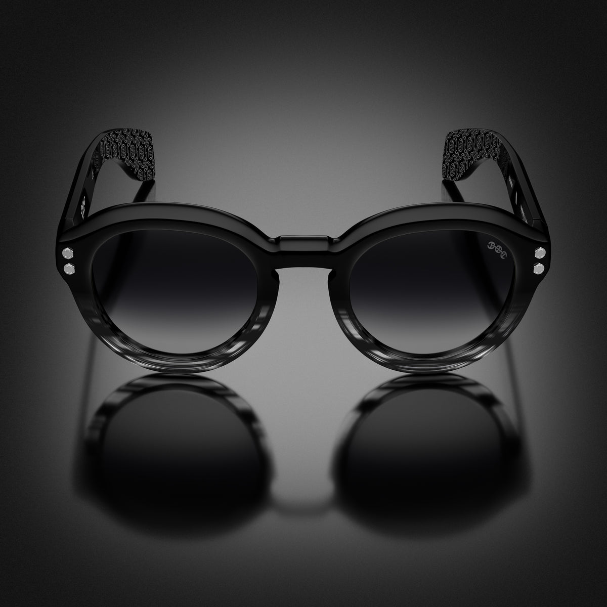 Model III eyewear in Black and Grey Tortoise Fade, front view