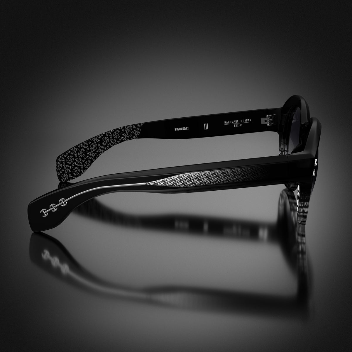 Model III eyewear in Black and Grey Tortoise Fade, side view