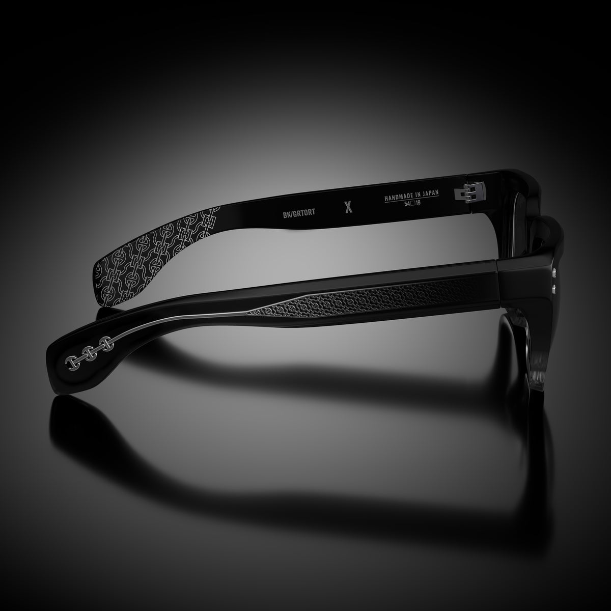 Model X eyewear in Black and Grey Tortoise Fade, side view